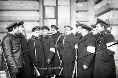 A group of students acting as militiamen, St Petersburg, 1917 by Russian Photographer